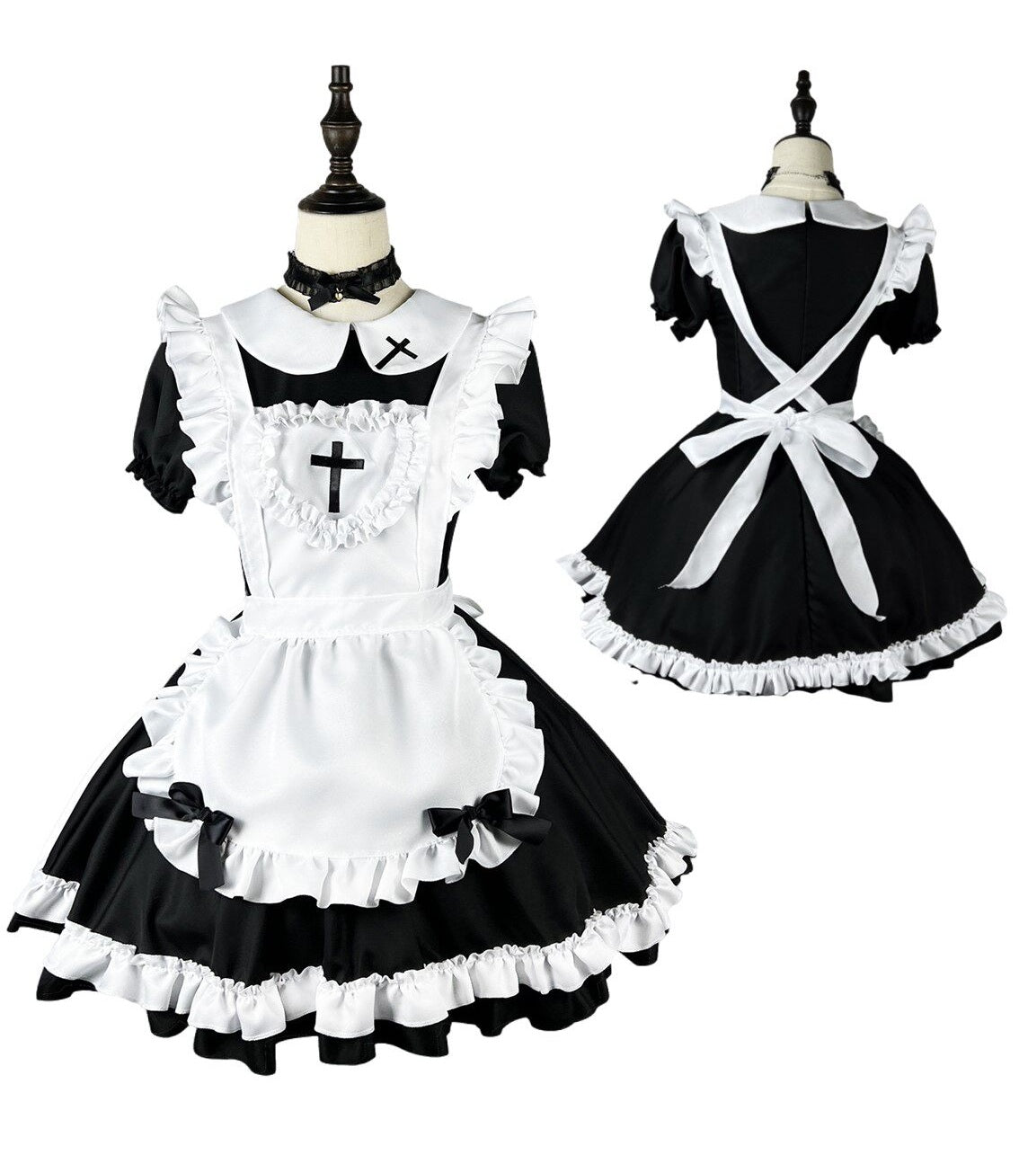Black and white maid outfit on mannequins with cross details.