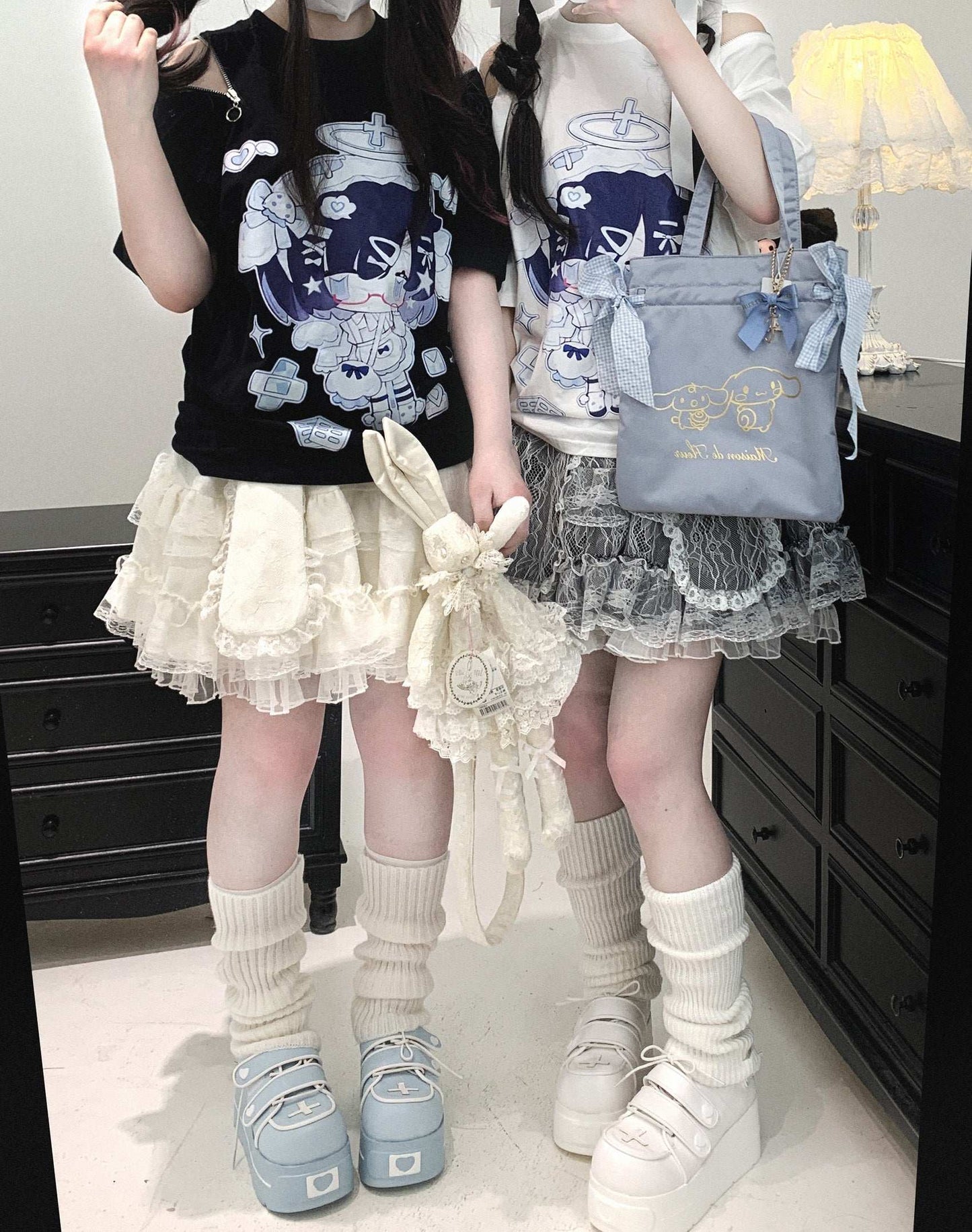 Two people in cute, pastel-themed outfits with a focus on accessories.
