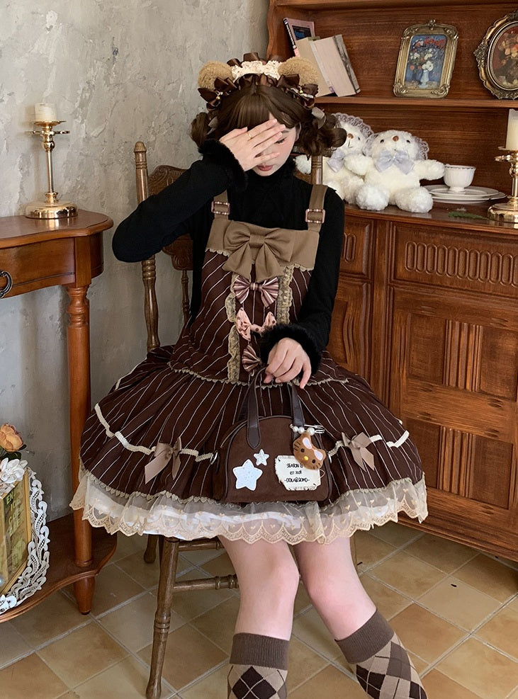 Person wearing a brown and beige dress with a bow, sitting in a room with wooden furniture and decor.