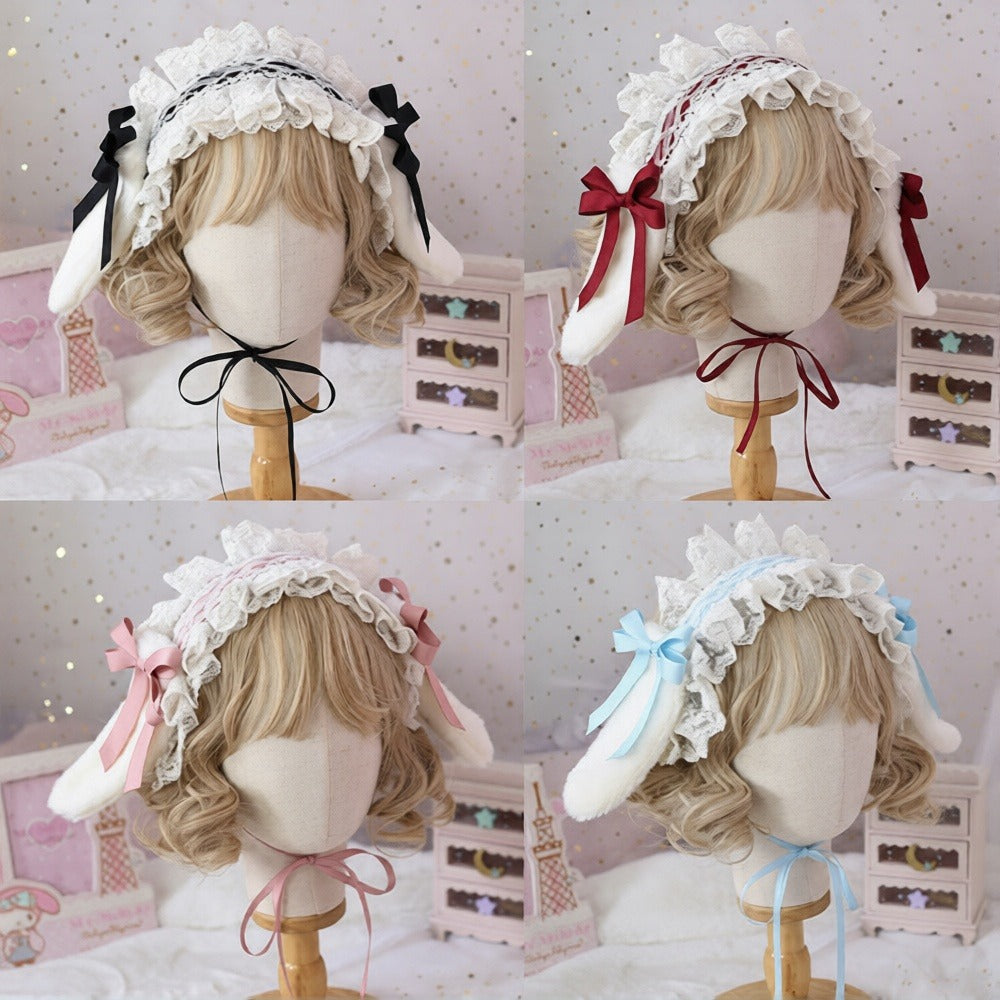 Set of three mannequin heads with decorative headbands on a soft pink background.