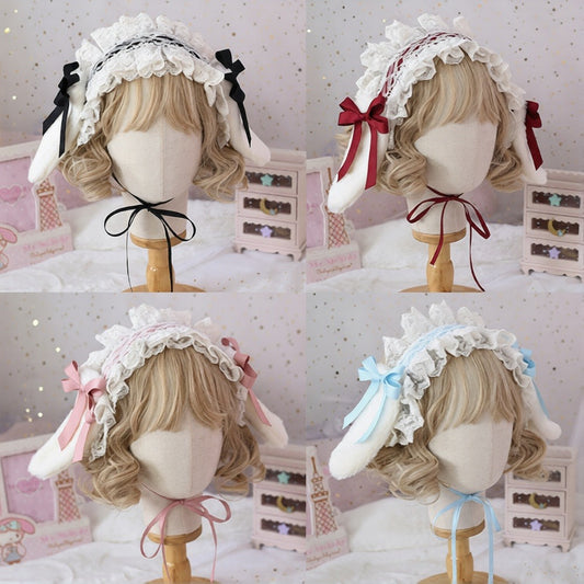 Set of three mannequin heads with decorative headbands on a soft pink background.