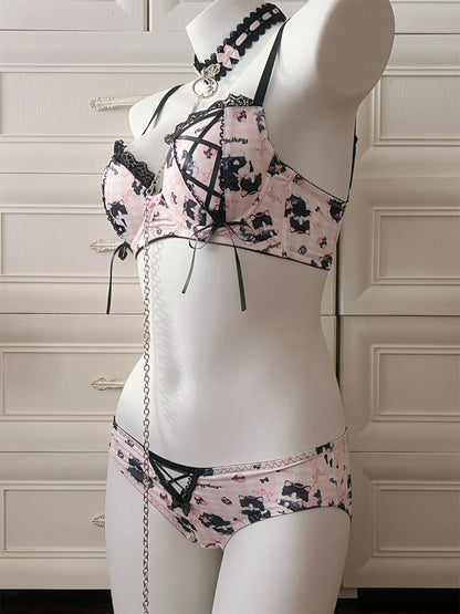 Lingerie set with floral pattern on a mannequin against a neutral background