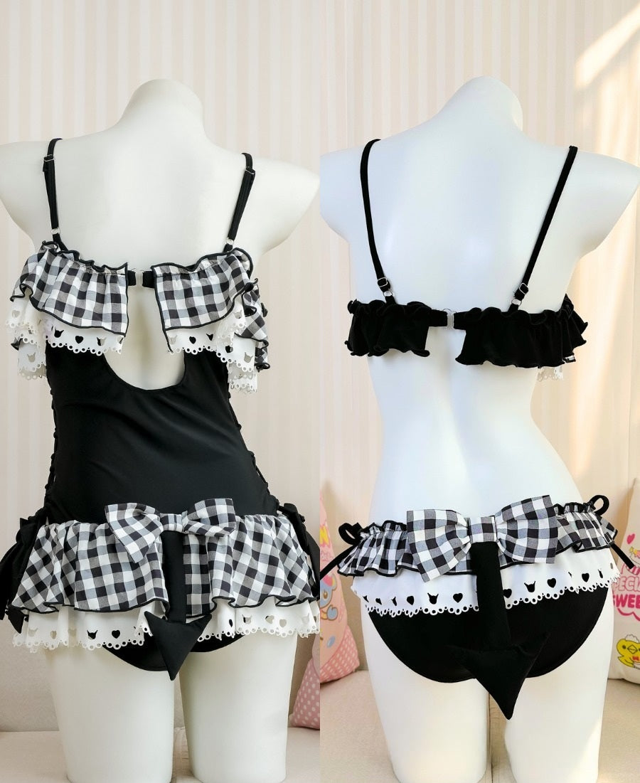 Black and white checkered lingerie set on mannequins with a light background