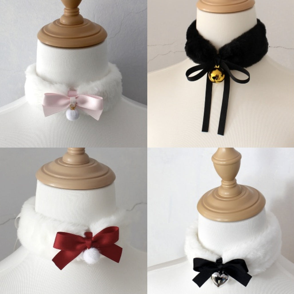 Four mannequin heads with different neck accessories on a white background