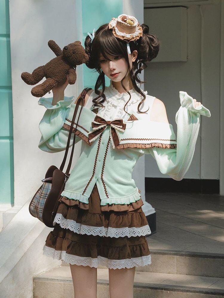 Person in a detailed outfit with a teddy bear head accessory, standing outdoors.