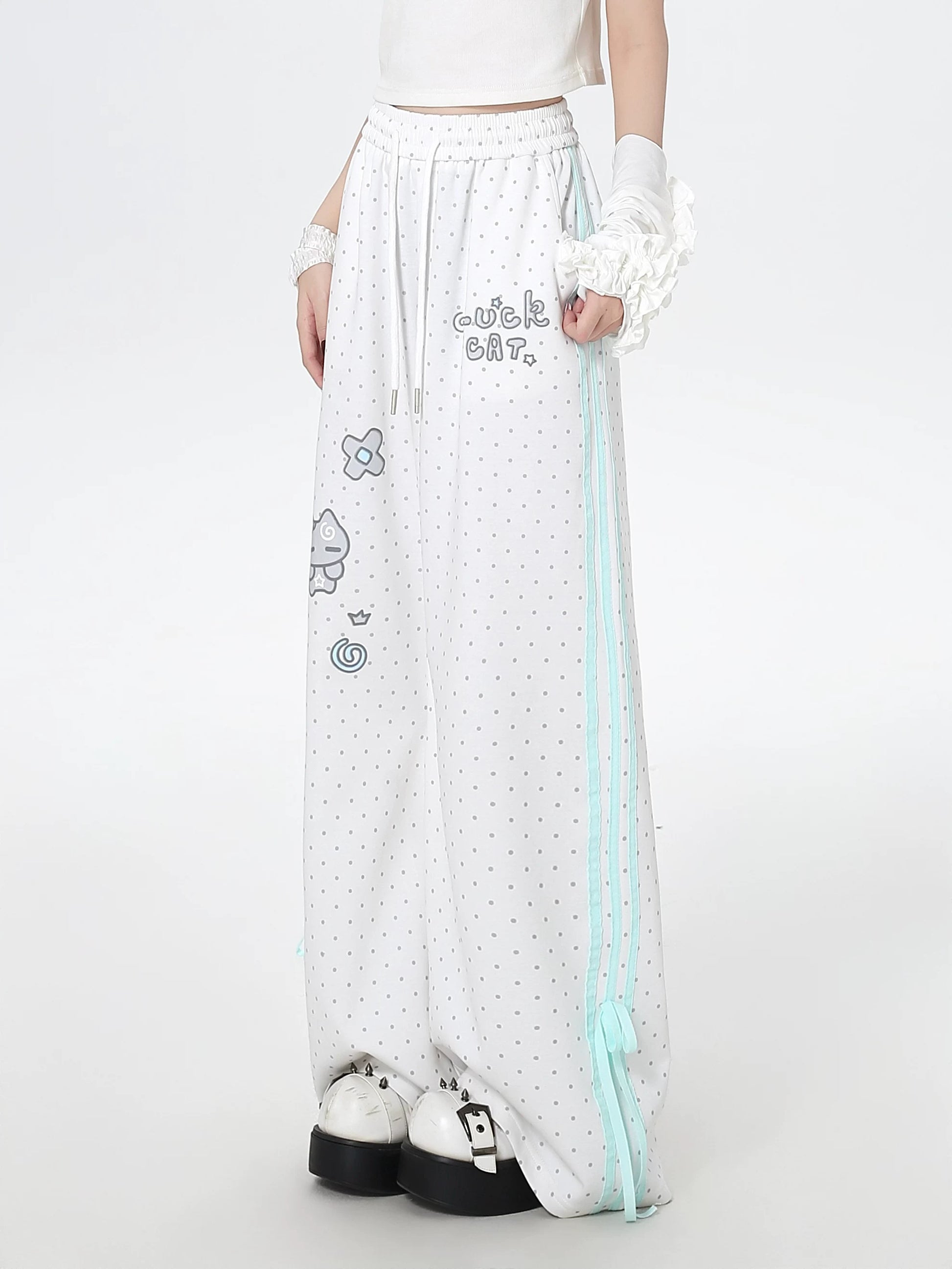 Long white skirt with blue stripes and cartoon designs on a white background