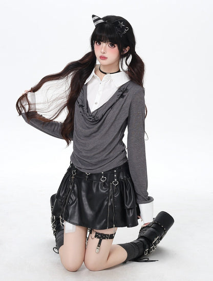 Person wearing a gothic-inspired outfit with a black leather skirt and cat ears on a white background