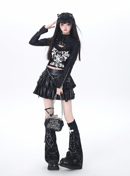 Person wearing a black and white outfit with cat ears on a white background