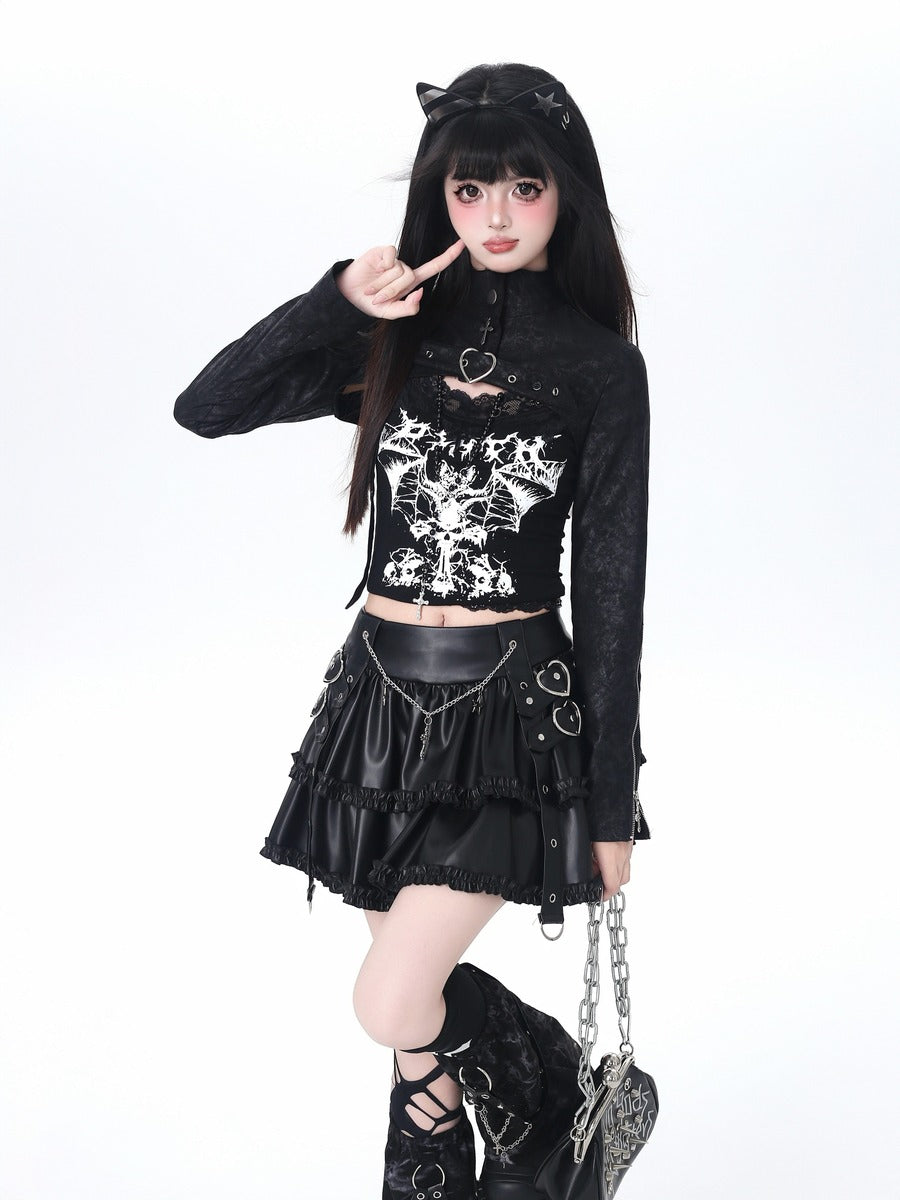 Person wearing a black and white outfit with cat ears on a white background