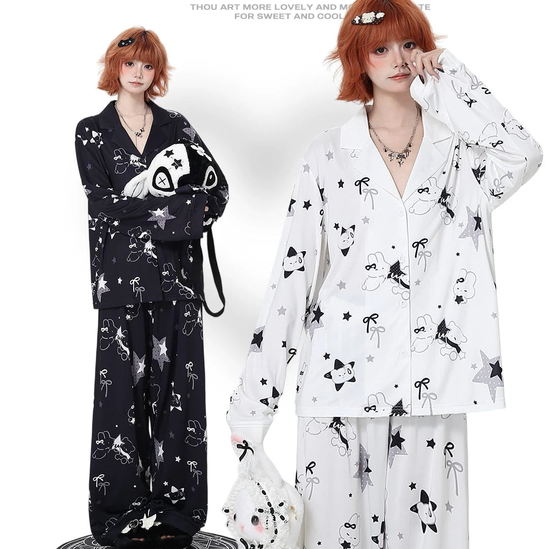 Two models pajamas outfits with black and white patterns on a white background.