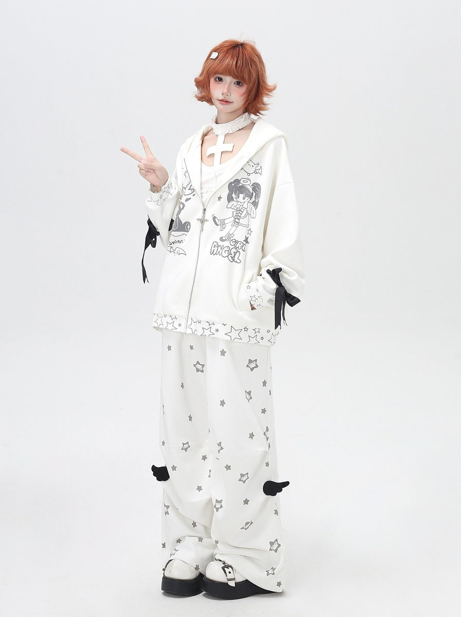 Person wearing a white outfit with black designs on a white background