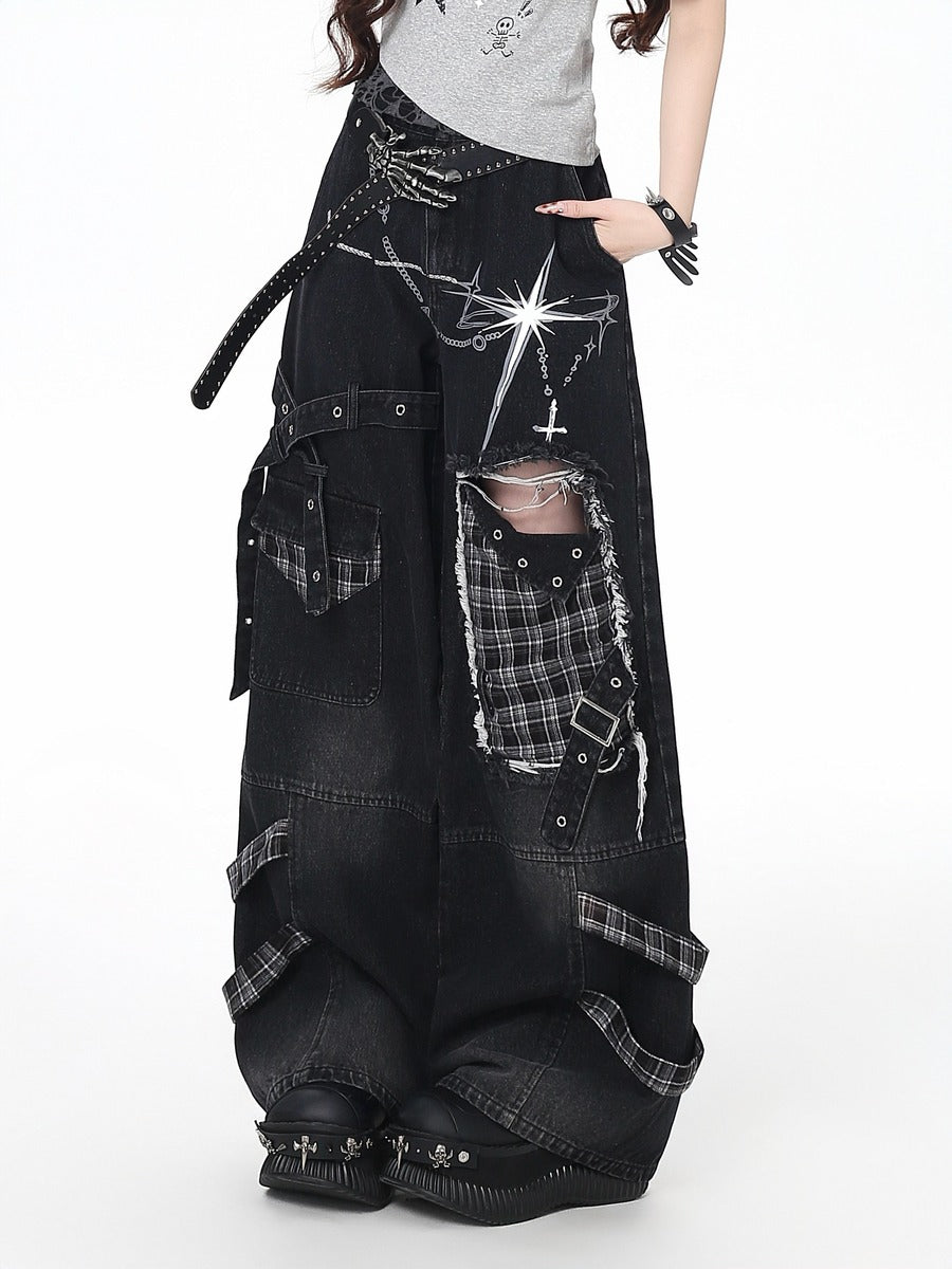 Black patchwork jeans with plaid patterns on a white background