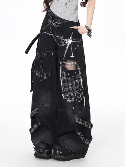 Black patchwork jeans with plaid patterns on a white background