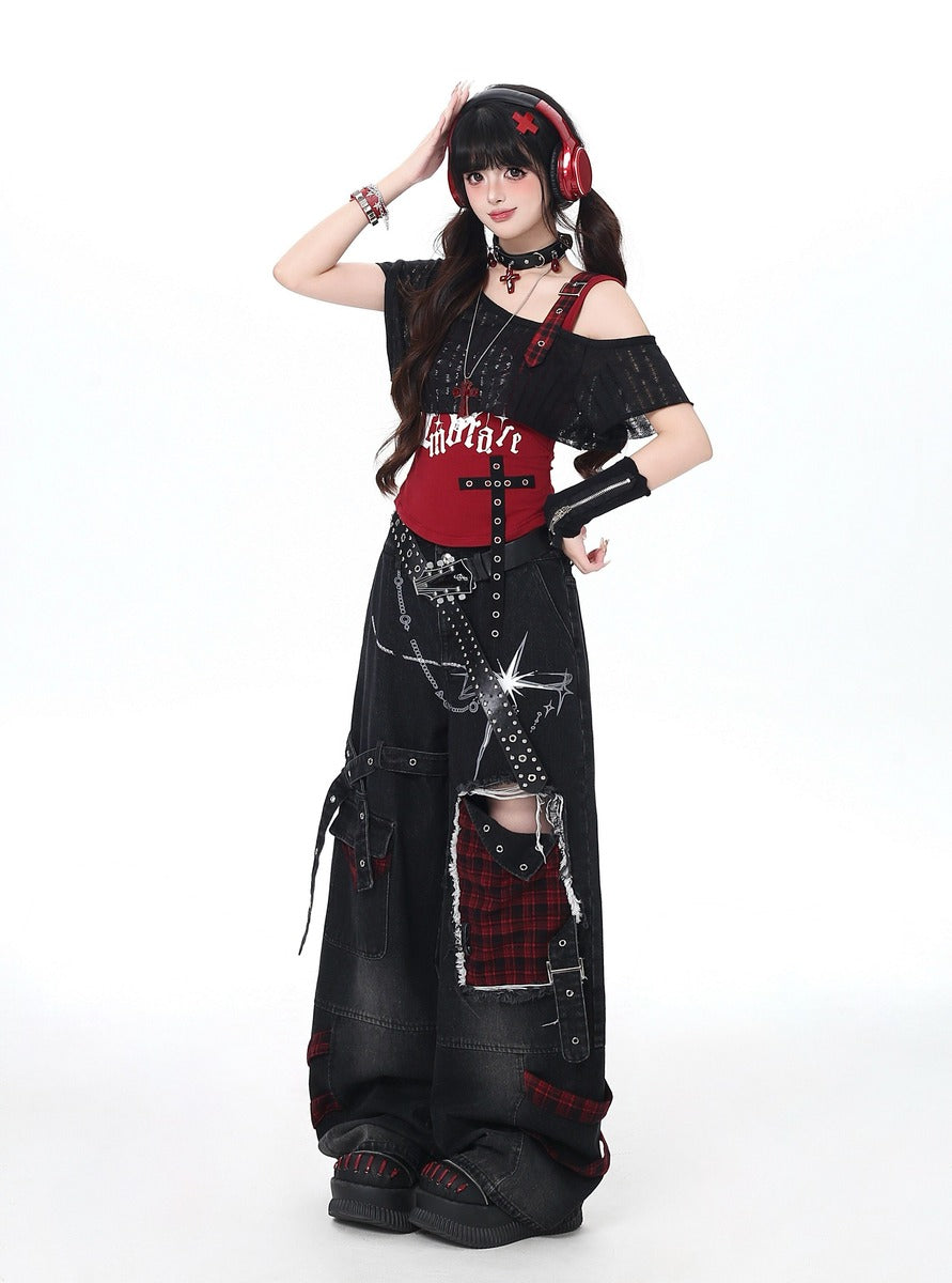 Person wearing a gothic-inspired outfit with black and red details on a white background