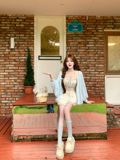 Woman posing on a wooden deck with a brick wall and door in the background