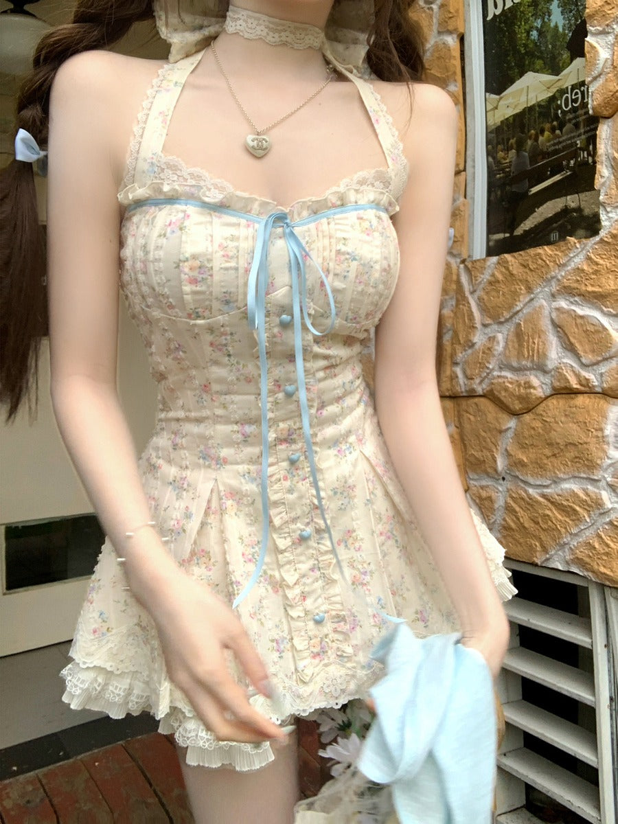 Woman wearing a floral dress with a stone wall background