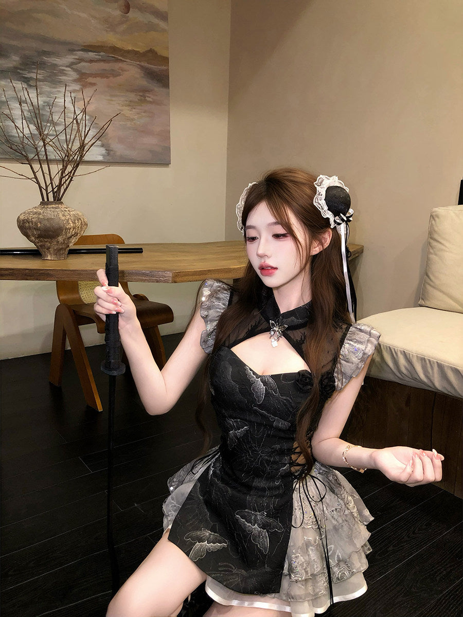 Person in a chinese outfit posing indoors with a painting in the background