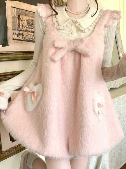 Pink fluffy dress with a lace collar worn by a person, with a decorative background.