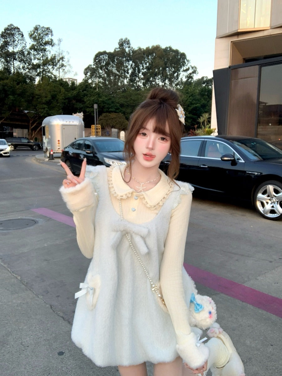 Woman in a white dress with a bow standing on a street