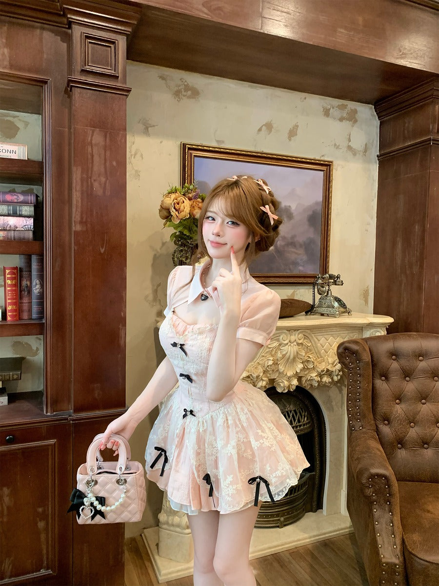 Woman in a vintage-style dress standing in a room with wooden furniture and decorative elements.