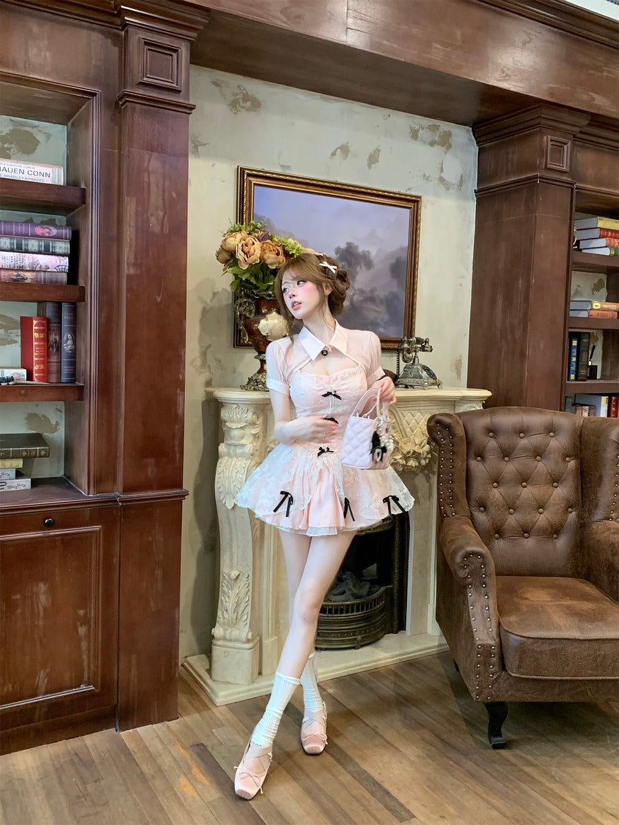 Woman in a stylish outfit standing in an elegant room with wooden furniture and a fireplace.