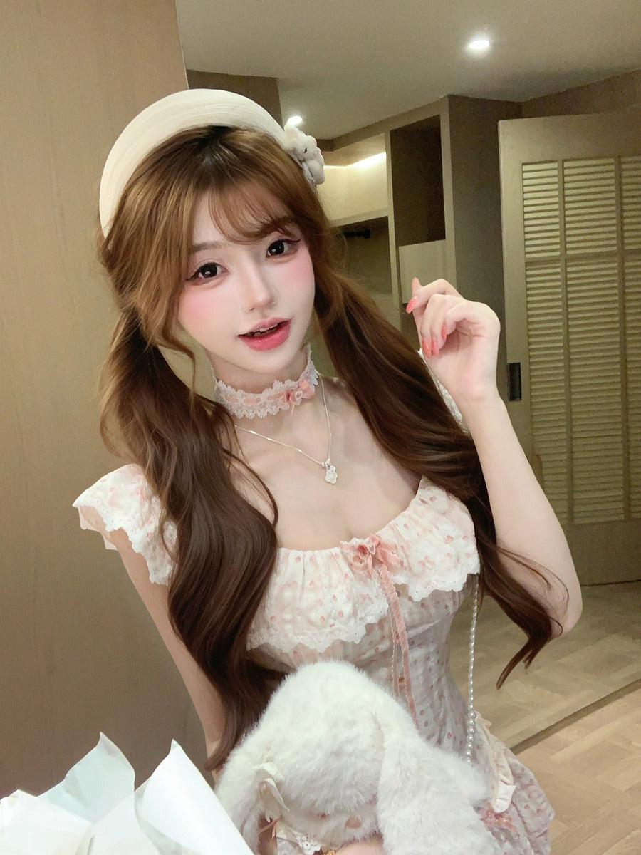Woman in a white dress with a headband in an indoor setting