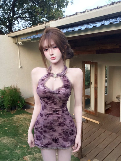 Mannequin wearing a purple dress in an outdoor setting