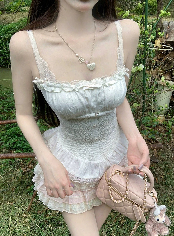 Woman in a white lace dress holding a pink handbag with a teddy bear in a garden setting