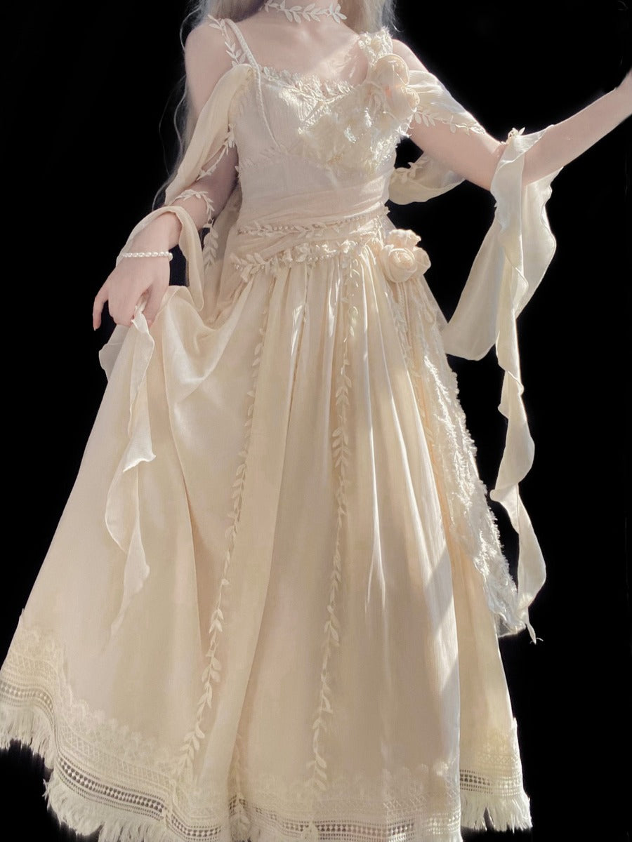 A cream-colored, off-the-shoulder gothic Lolita dress with intricate lace and embroidery, shown on a model against a solid black background.