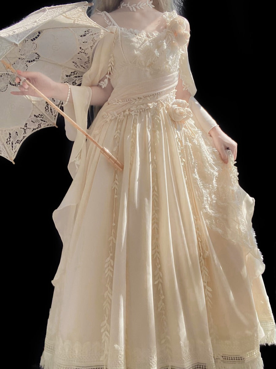 A cream-colored Victorian-style Lolita dress with intricate lace embroidery, sheer sleeves, and a matching lace parasol, shown on a model against a solid black background.