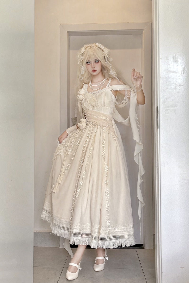 A person wearing a long cream-colored Lolita-style dress with lace details, a matching headpiece, and white Mary Jane shoes, standing in a doorway.