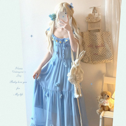 Person wearing a blue dress with bunny ears and a teddy bear, standing in a room with a mirror and decorative items.