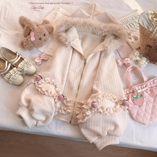 Cute outfit with jacket, shoes, and accessories on a white surface