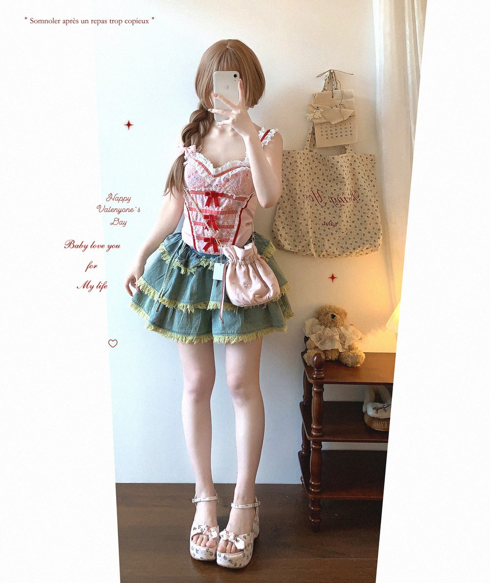 Person wearing a colorful outfit with a skirt and top, standing in a room.