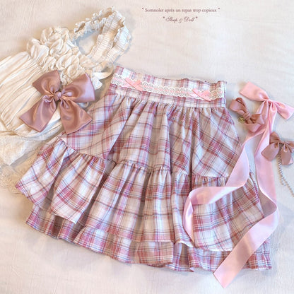 Plaid skirt with ribbons and a bow on a light background