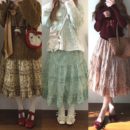 Three women in vintage-style outfits with floral patterns and accessories.