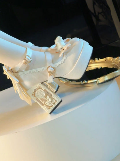 White high-heeled shoes with decorative elements on a black background