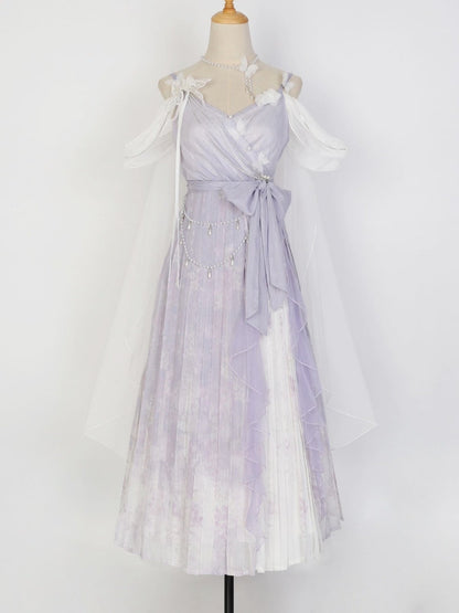 A lavender and white tie-dye Lolita dress displayed on a mannequin with a matching sheer white tulle capelet and veil.