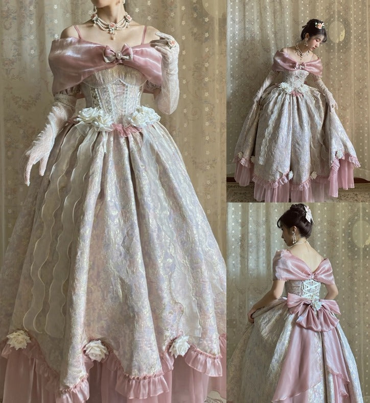 A vintage-style Lolita ball gown shown in three views: a large front view on a mannequin, a smaller front view with a model, and a back view. The dress features a pink satin off-the-shoulder bodice with a large bow, a white lace corset waist, and a voluminous white lace skirt with pink ruffles and floral accents.
