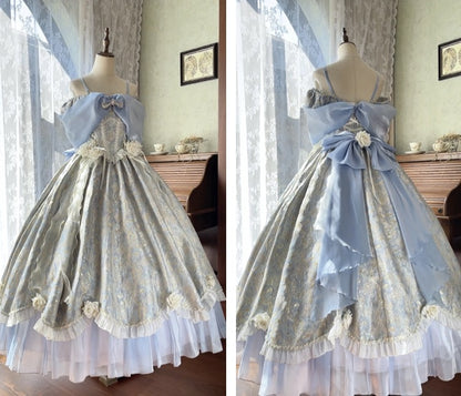 A light blue and silver Lolita-style ball gown displayed on a dress form, shown in a split-screen view from the front and back. The dress features a voluminous silver patterned skirt with a light blue off-the-shoulder bodice, a large bow at the back, and white floral accents.