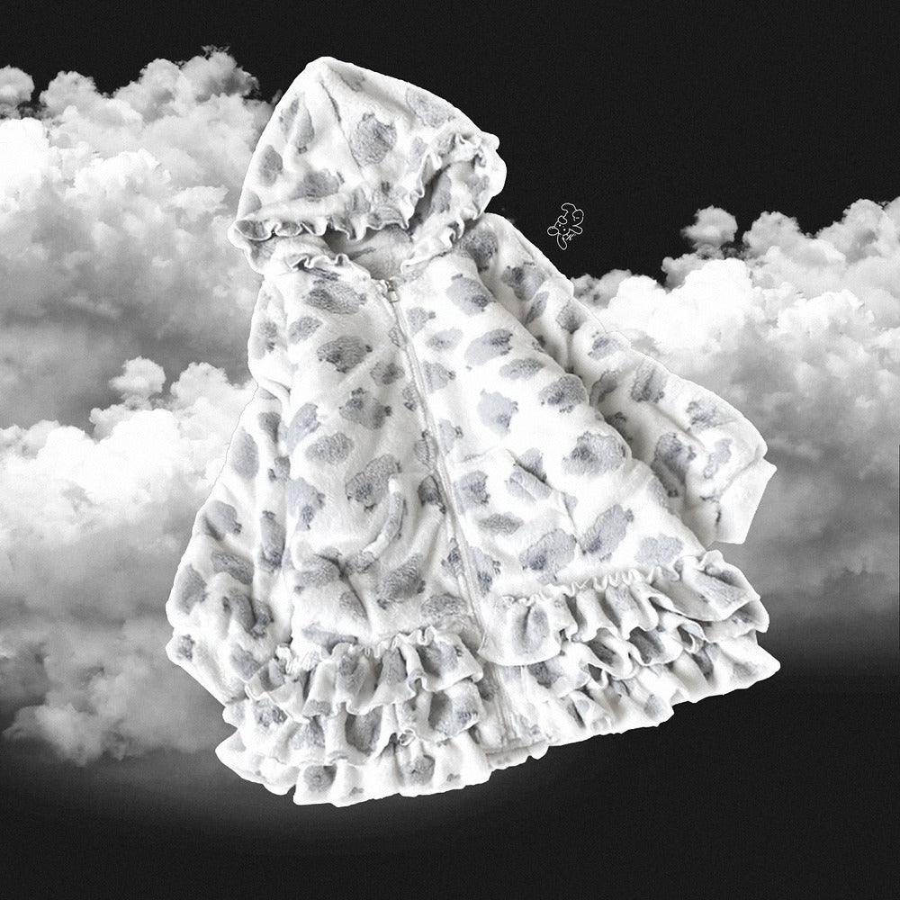 Sheep print baby blanket with ruffles on a cloud background