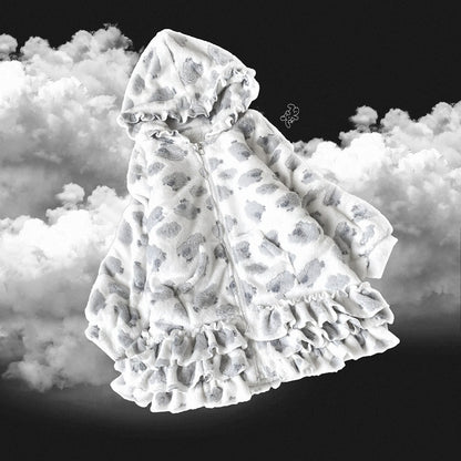 Sheep print baby blanket with ruffles on a cloud background