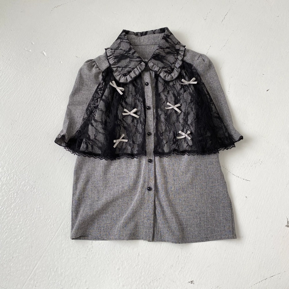 Gray outfit with lace detailing on a white background