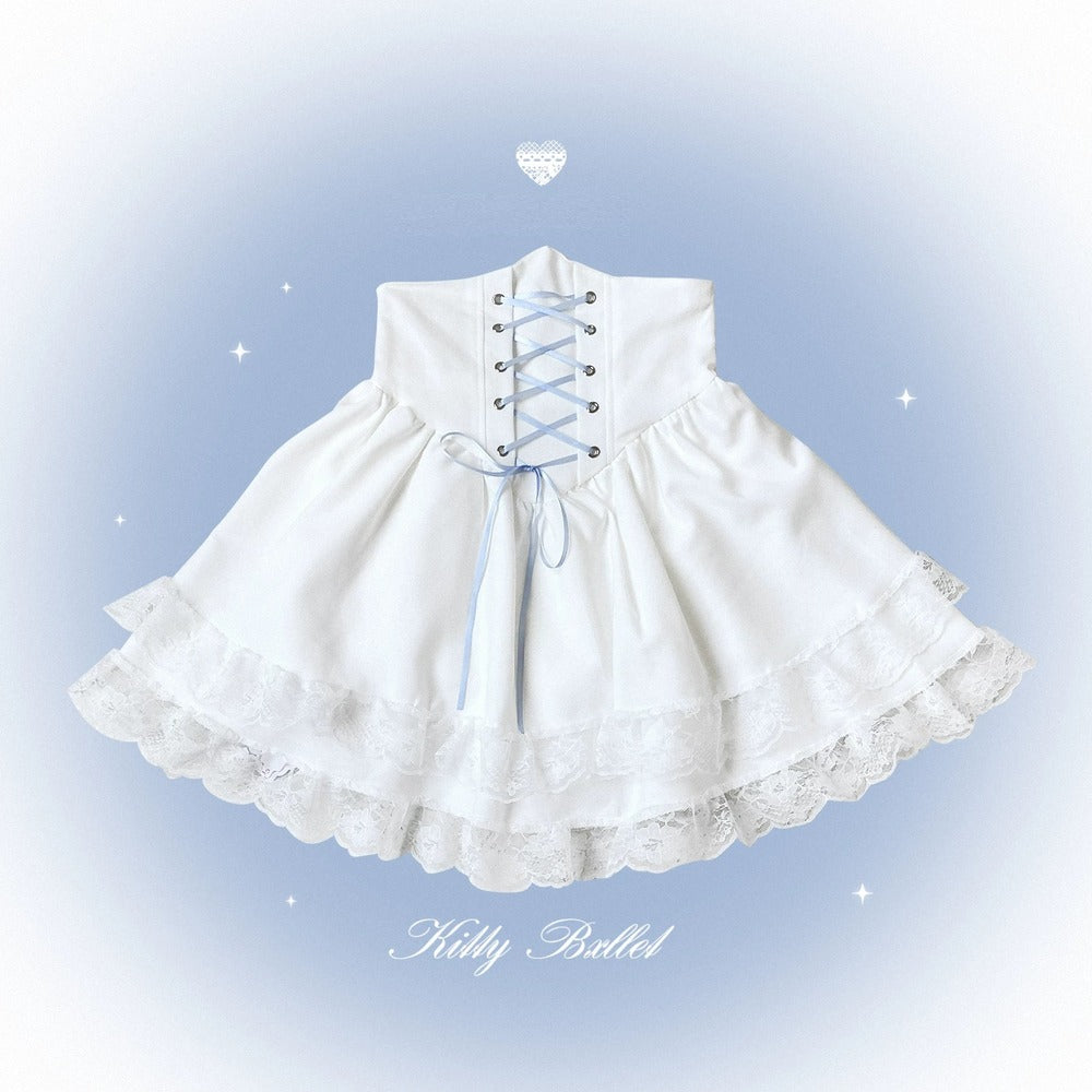 White Lolita-style skirt with lace trim and blue ribbon laces, shown on a soft blue gradient background with decorative sparkles and the text 'Kitty Ballet' at the bottom.