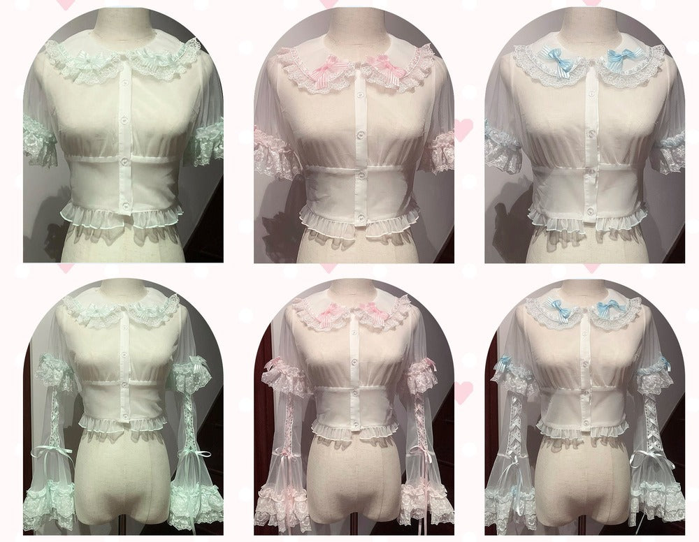 Set of lace-trimmed blouses on mannequins with a dark background