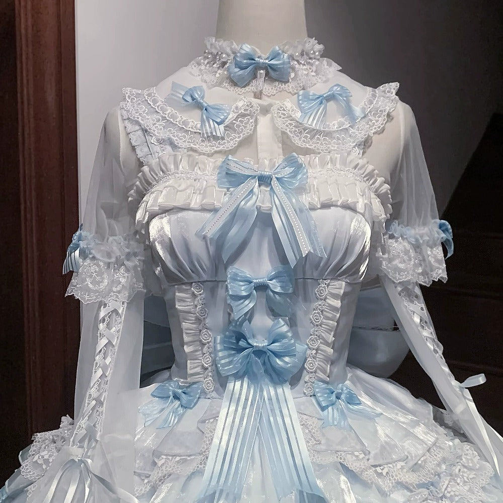 Detailed blue and white lace outfit on a mannequin against a neutral background