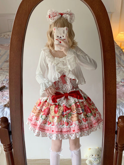 Person wearing a white blouse with ruffles and a colorful skirt in front of a mirror.