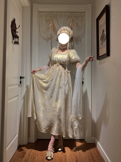 Person wearing a white dress with a bonnet in a room with a door and framed picture.