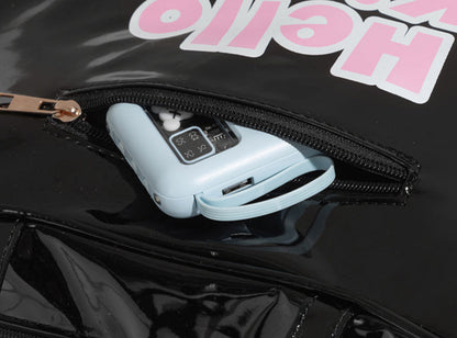 Black leather bag with a white electronic device inside, featuring pink text on a gray background.