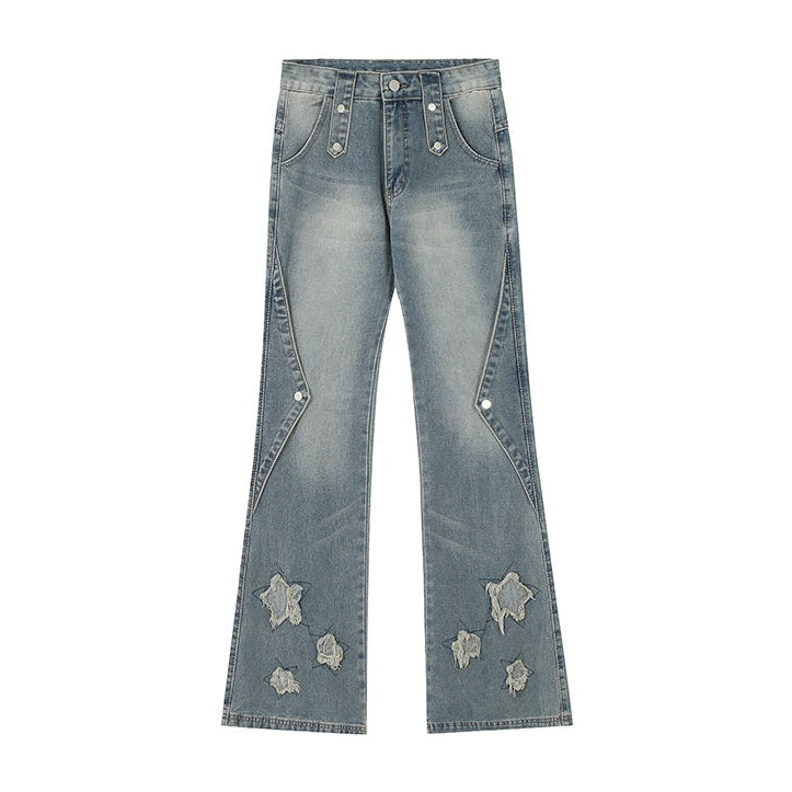 Blue jeans with star patches on a white background